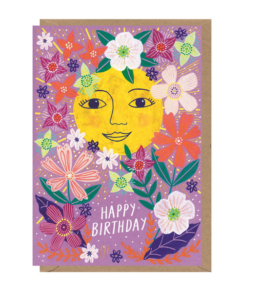 Sun face surrounded by flowers card